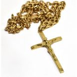 A 9 CARAT GOLD CRUCIFIX AND 9 CARAT GOLD CHAIN the crucifix pendant 4cm x 3cm to a heavy gage