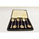 A CASED SET OF SIX SILVER DESSERT SPOONS hallmarked London 1922, total silver weight approx. 9