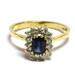 A SAPPHIRE AND DIAMOND CLUSTER 9 CARAT GOLD DRESS RING cushion shaped cluster, rectangular cut