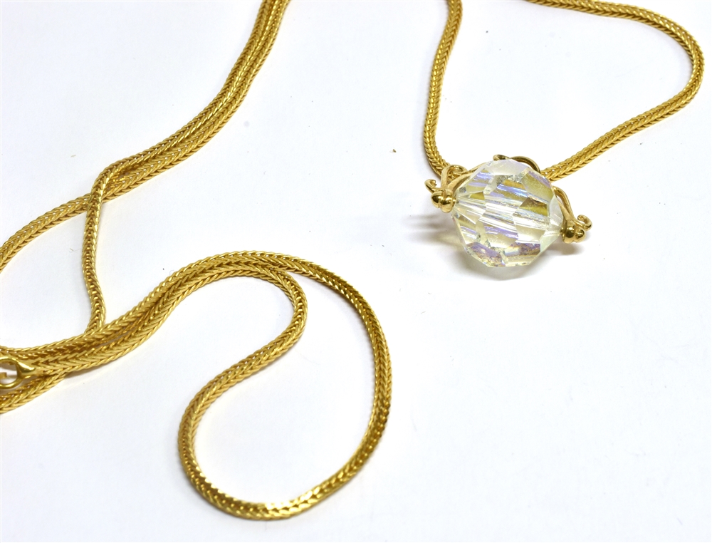 AN 18 CARAT GOLD SQUARE FOX LINK CHAIN modern hallmark, together with a yellow metal crystal