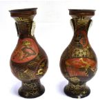 A PAIR OF JAPANESE PORCELAIN VASES with enamelled and gilded decoration imitating lacquer, decorated