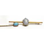 A 9 CARAT GOLD MOONSTONE SET BAR BROOCH/PIN together with a turquoise single stone set stick pin