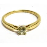A DIAMOND SOLITAIRE 9 CARAT GOLD RING round brilliant cut diamond weighing 0.25 carat stamped,