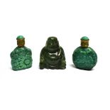 A CARVED HARDSTONE BUDDHA FIGURE 5.5cm high, and two snuff bottles with floral relief decoration