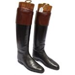 A PAIR OF GENTS JOHN LOBB BLACK LEATHER HUNTING BOOTS with brown tops, the wooden trees with black