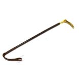 A CHILD'S RIDING CROP with antler grip, plated collar and plaited leather shaft