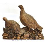 A RESIN PLAQUE of a pair of grouse with 'J Purdey & Sons Ltd' label verso, 34 cm high,