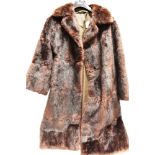 A LADIES LONG FUR COAT