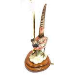 A CAPODIMONTE COCK PHEASANT FIGURE TABLE LAMP mounted on a shaped wooden base, height of lamp