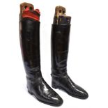 A PAIR OF GENT'S BLACK LEATHER HUNTING BOOTS with trees, size 9