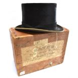 A GENT'S BLACK SILK TOP HAT by 'Christy's London', size 6 1/4', in a 'Bates' hat box