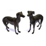 A PAIR OF HEAVY CAST FIGURES of Whippets 30cm high, 34cm long