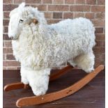 A ROCKING SHEEP on bow rockers, overall 91cm long.