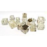 A GROUP OF ASSORTED GLASS INKWELLS