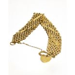 A 9 CARAT GOLD LINK 9 ROW BRACELET WITH FLAT PADLOCK FASTENER the bracelet with diagonal pattern