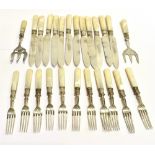 A SET OF TWELVE SILVER BLADED KNIVES AND ELEVEN SILVER FORKS and collars with mother of pearl