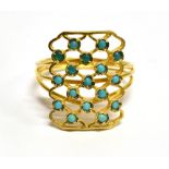 A TURQUOISE SET WIREWORK RING the front open lattice design rectangular head set with small round