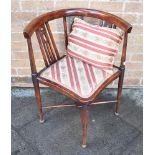 AN EDWARDIAN STAINED BEECH CORNER ARMCHAIR with line inlaid decoration