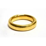 A 22 CARAT GOLD PLAIN WEDDING BAND the D profile heavy gage wedding band 5mm wide, hallmarked 22