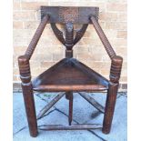 AN OAK TURNERS CHAIR 64cm wide 87cm high