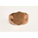 A 9CT ROSE GOLD SIGNET RING the shield form front inscribed 'Conquest of Jerusalem XII 17', to shank
