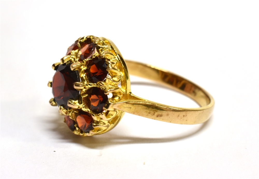 A GARNET ROUND CLUSTER 9 CARAT GOLD DRESS RING central round mixed cut red garnet 6mm diameter, - Image 3 of 3