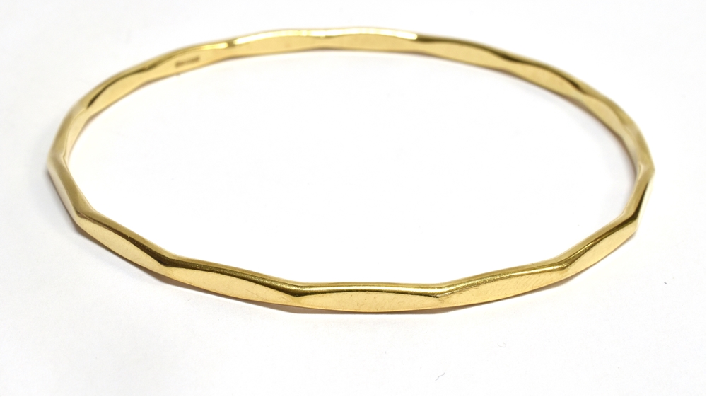 A 9 CARAT GOLD SLAVE BANGLE plain polished with waved borders, measuring 7cm diameter, weighing - Image 2 of 2