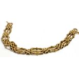 A 9 CARAT GOLD GATE BRACELET the three bar lozenge shaped links with scroll patterning, end loop