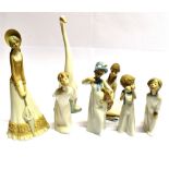 A GROUP OF LLADRO, NAO AND OTHER SIMILAR FIGURES including a pair of Lladro figures of a boy and