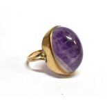 A BLUE JOHN SINGLE STONE SET 9 CARAT GOLD SIGNET RING the large oval cabochon cut piece of blue john