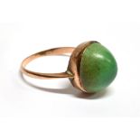A GREEN SINGLE STONE SET ROSE GOLD DRESS RING the oval cabochon cut stone approx. 13mm x 12mm, bezel