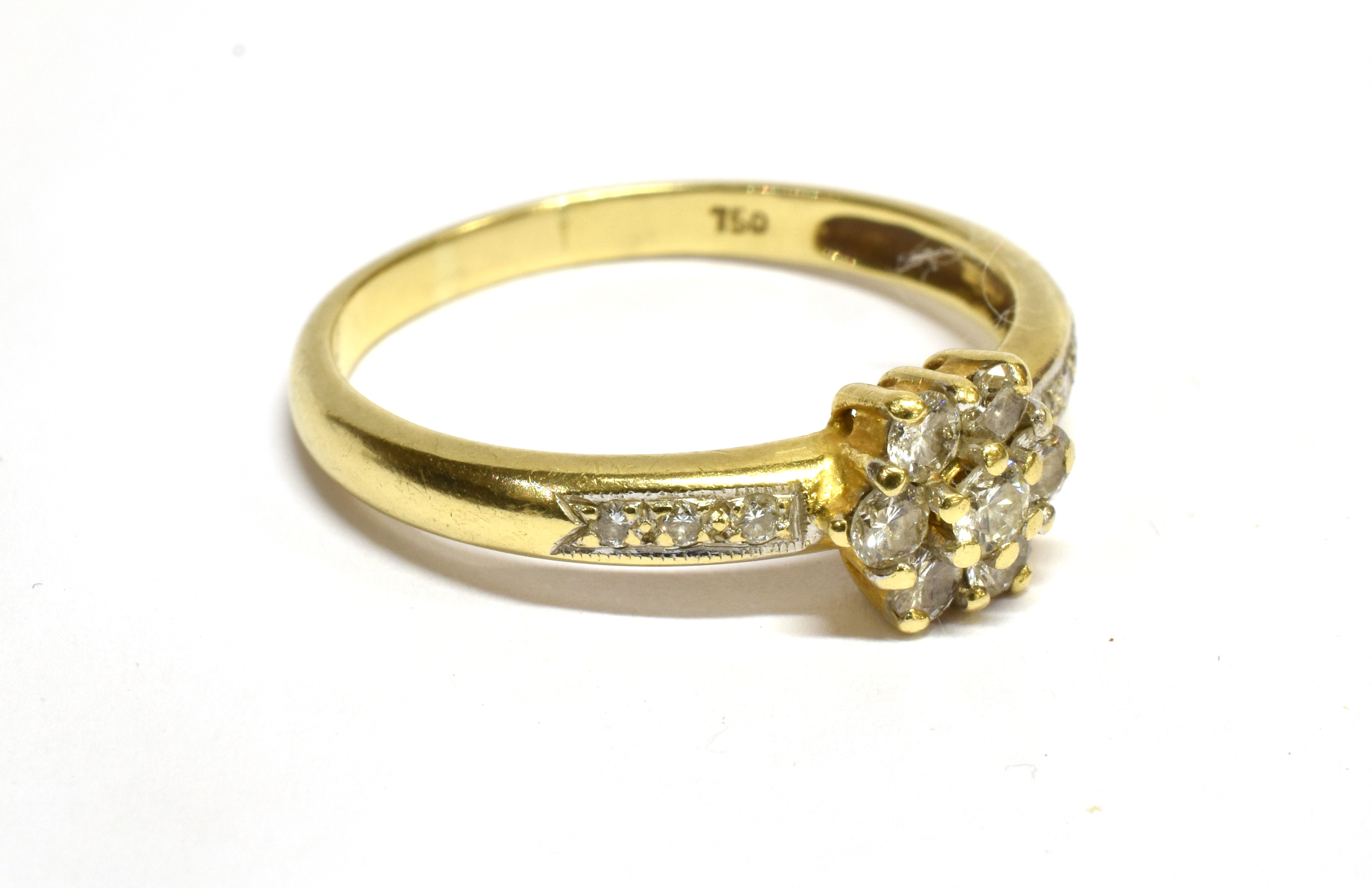 A DIAMOND FLOWER HEAD CLUSTER 18 CARAT GOLD RING the flower head cluster comprising seven round - Image 2 of 5