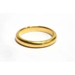 AN 18 CARAT GOLD PLAIN WEDDING BAND of D profile section 3mm wide, hallmarked 18 carat gold, ring