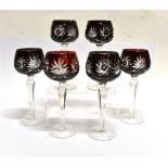 A SET OF SIX HOCK GLASSES with flash cut ruby glass bowls, 19.5cm high