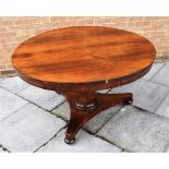 A VICTORIAN ROSEWOOD BREAKFAST TABLE the circular tilt top 130cm diameter, on hexagonal pillar