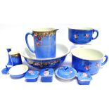 AN EXTENSIVE EDWARDIAN WASHBASIN SET comprising jug, basin, two chamberpots, soap dish,