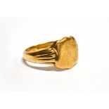 A GENT'S 18CT GOLD SIGNET RING shield shaped front with monogrammed initials, grooved shoulders to