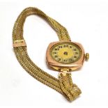 A LADIES VINTAGE 9 CARAT ROSE GOLD WATCH on a 9 carat gold mesh bracelet, gross weight including