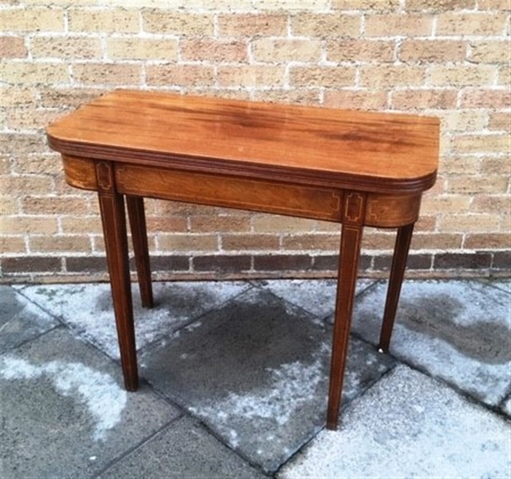 A 19TH CENTURY MAHOGANY TEA TABLE the oblong top with reeded edge, single frieze drawer, on ring