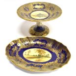 A SPODE CABINET PLATE the reserve painted with a landscape scene signed 'perry', on a Royal blue