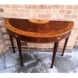 A REPRODUCTION DEMI-LUNE HALL TABLE with crossbanded and marquetry style decoration, on square