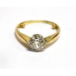 A DIAMOND SOLITAIRE GOLD RING the round old brilliant cut diamond weighing approx. 0.75 carat,