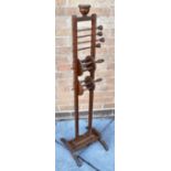 A CARVED WOODEN 'SQUIRREL CAGE' YARN WINDER overall 116.5cm high.