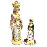 A LARGE CONTINENTAL COLOURED BISQUE FIGURE 44cm high, and a Capo di Monte figure, 31mc high