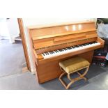 AN IRON FRAMED OVERSTRUNG UPRIGHT PIANO by Barratt & Robinson, in light mahogany case, serial number