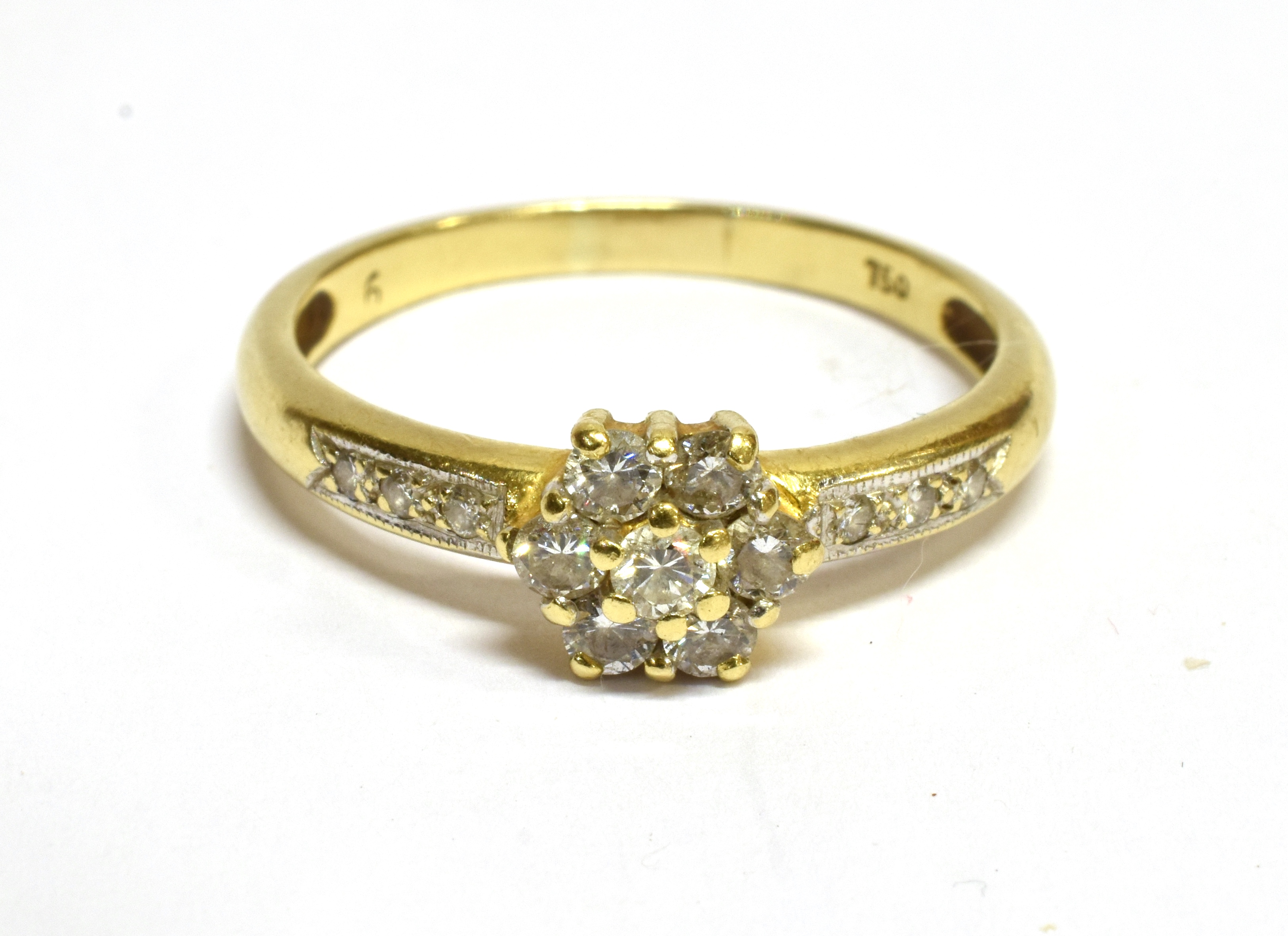 A DIAMOND FLOWER HEAD CLUSTER 18 CARAT GOLD RING the flower head cluster comprising seven round - Image 3 of 5