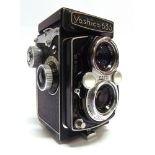 A YASHICA 635 TWIN LENS REFLEX CAMERA with Yashikor 1:3,5 f=80mm viewing and taking lenses and a