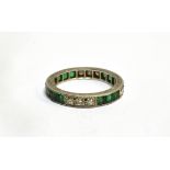 AN EMERALD AND DIAMOND FULL ETERNITY PLATINUM RING channel and bead set alternating three square cut