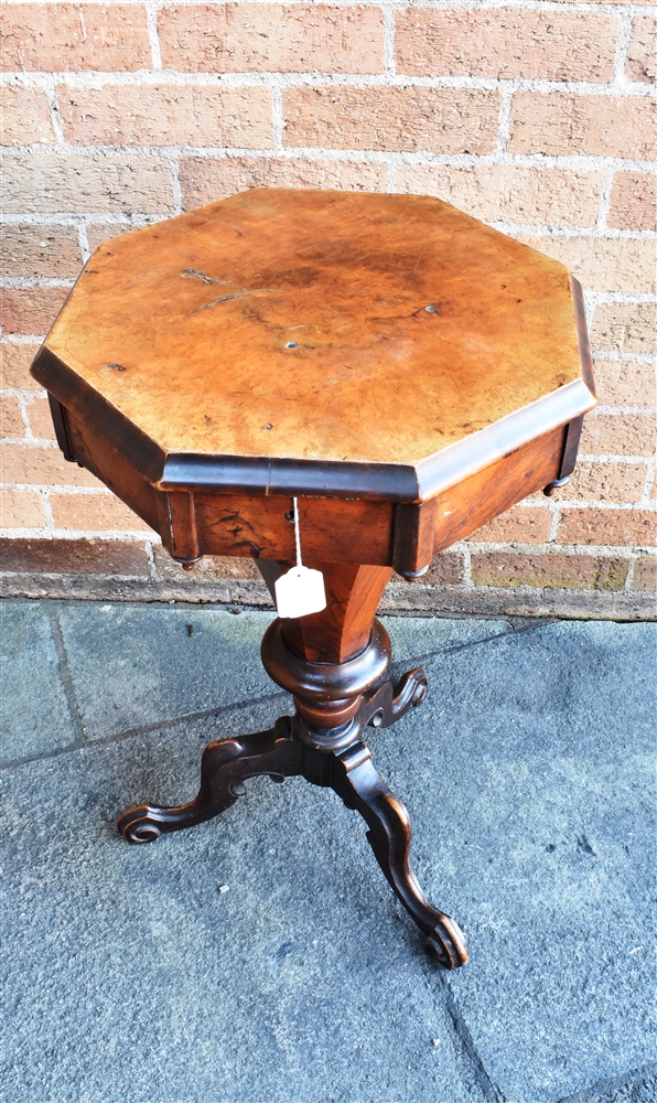 A VICTORIAN WALNUT TRUMPET SHAPED WORK TABLE the octagonal hinged lid lifting to reveal a fitted