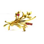 A 9 CARAT GOLD RUBY SET SPRAY BROOCH four small round cut rubies approx. 2mm diameter, roll over